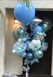 Baby blue-colored balloons